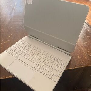 Apple Tablet with White Keyboard Case